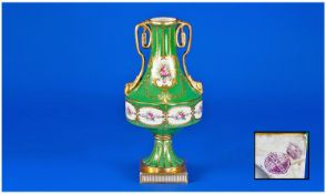 Minton`s Two Handled Classical Shaped Vase. Floral panels within emerald green ground and gold