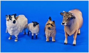 Collection of Four Beswick Animal Figures, comprising Jersey bull, goat, sheep and a dog,