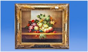 Oil Painting On Panel Of Fruit On A Ledge, unsigned and in a gilt frame. 24 inches by 20 inches.
