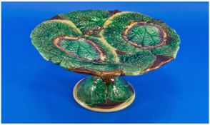 Majolica Cake Stand, Marked to base with a W in underglaze blue, with a cabbage leaf embossed
