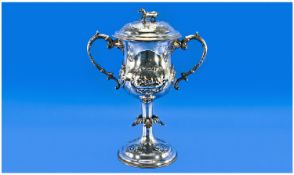 Victorian Fine Quality Silver Two Handle Lidded Trophy Cup. Decorated in high relief with raised