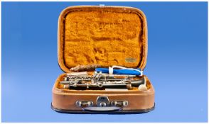 Clarinet In Case By `Corton`, made in Czechoslovakia, of Bakelite with chrome mountings.