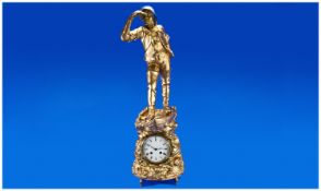 A Large Gilded Spelter Clock Of The Fisherman Looking Out To Sea, standing on a rock encompassed
