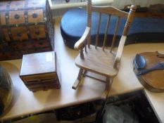 Two Pieces Of Dolls Furniture, miniature rocking chair with a 1930`s Deco walnut three drawer