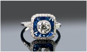 Art Deco Platinum Set Diamond & Sapphire Ring, The central single stone diamond flanked by 16