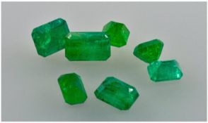 A Collection Of Seven Step Cut Emeralds, unmounted, of good colour. 11.32cts in total.