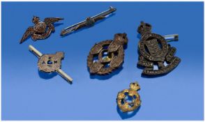 A Small Collection Of Military Cap Badges, 6 in total, including R.F.C, R.A.F, Royal Corps Army