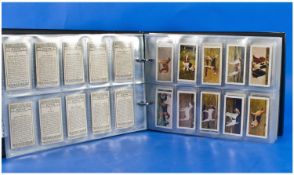 Well Presented Cigarette Card Album In Slip Case containing sets from Wills, Players & Senior
