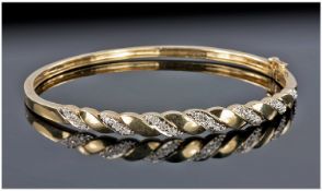 9ct Gold Diamond Set Hinged Bangle.