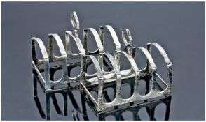 Pair of Small Silver Toast Racks, Hallmarked For Adie Brothers Birmingham 1932. Length 3 Inches.