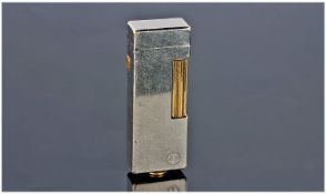 Dunhill Lighter, Plain Silver Tone Case With Gilt Mounts. Marked To Base Swiss Made.