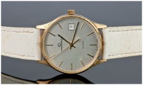 Garrards Gents 1970`s 9ct Gold Wrist Watch, fitted on white leather strap. Day/date. Good