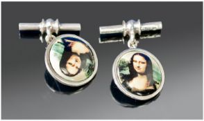 Gents Set Of Silver Cufflinks, Of Circular Form With Chain Links, The Fronts Showing Images Of The