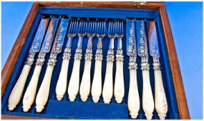 A Boxed Set Of Mother Of Pearl Knives And Forks. 12 pieces in total.