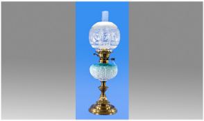 Victorian Fine Brass And Glass Oil Table Lamp, with pale blue embossed front and elegant circular