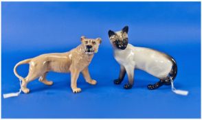 Beswick Animal Figures, 2 in total. 1. Siamese Cat Standing, model number 1897. 6.5`` in height.