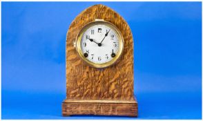 Oak Cased Mantle Clock, with a Gothic shaped case, white dial and Arabic numerals, 13 inches high.