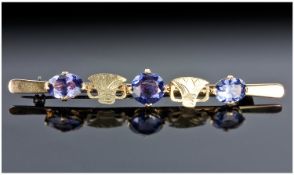 Gold Bar Brooch Set With Three Alexandrite Coloured Stones, Length 83mm, Unmarked.