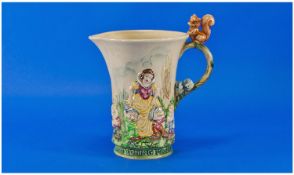 Wadeheath Musical Jug ``Snow White and The Seven Dwarfs``. c.1938. 8.75 inches high. Light grazing,