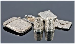 A Small Collection Of Silver Items, 6 Items In Total. Comprises; 1, A silver stamp holder in the