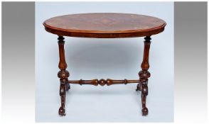 Mid Victorian Walnut Side Table, with oval top, applied with walnut quarter veneering and satinwood