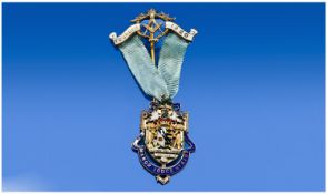 A Victorian Masonic Silver Gilt & Enamel Medal, Manor Lodge No. 4202. Hallmark London 1860. With