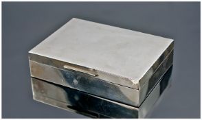 A Modern Silver Table Cigarette Box. Hallmark London 1983. Of plain form with cedar wood interior.