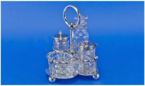 Edwardian Silver Plated and Glass 4 Piece Cruet Set with Stand. Good quality. 6 inches high.
