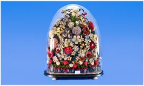 A Fine Victorian Large Glass Dome Containing A Large Flower/Fabric Display/Spray. Standing 22`` in
