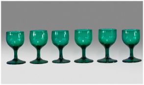 Set of Five Antique Green Bristol Wine Glasses, with tulip shaped bowls and plain stems, with rough