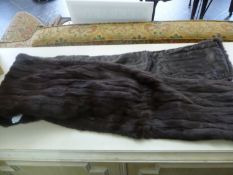 Dark Brown Ermine Stole, shaped to the neck giving a slight stand collar to the back, lined with