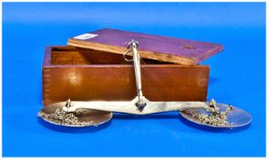 A Boxed Set Of Avery Hand Scales With Weights, chrome plated.