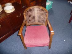 Early 20th Century Armchair, canework to back, padded seat, 26 inches high.