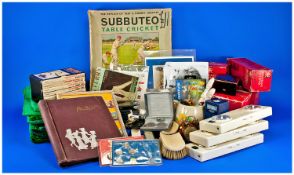 Interesting Box Containing Various Items, including 10 Subbuteo pitches, football and cricket, with