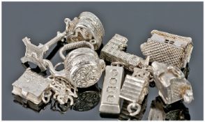Collection Of 10 Silver Charms.