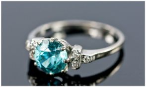 18ct Gold Blue Zircon And Diamond Ring, Central Round Cut Zircon Set Between Six Round Cut Diamonds