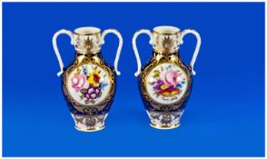 Derby, Pair Of Small Hand Painted Two Handled Vases. Circa 1800-1825. Painted mark to underside.