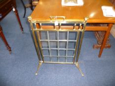 Brass Framed Glass Fire Screen, raised on splayed legs, the glass of sectional form, 31 inches