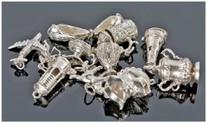 Collection Of 10 Silver Charms.