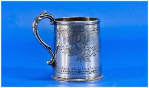 Mid Victorian Silver Christening Mug, finely engraved with foliage decoration to middle with a