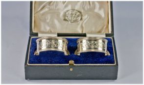 Chester Silver. A Pair Of Floral Decorated Napkin Rings. Hallmarked for Chester 1911. Boxed.