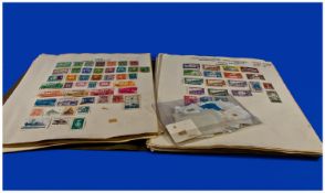 Stamp Album Containing A Varied Collection Of Mixed 20thC  World Stamps