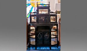 Late Victorian Ebonized Chiffonier, circa 1880, with mirrored back, ornate cornice, the base with
