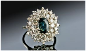 18ct White Gold Diamond & Sapphire Cluster Ring, Set With A Dark Blue Sapphire Surrounded By Round