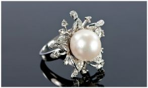 18ct White Gold Pearl and Diamond Cluster Ring, stamped 750, diamond weight 70 points, VS clarity,