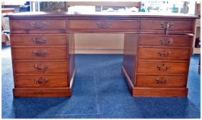 Early 20th Century Pedestal Desk, red leathered top, fitted with two short drawers and long central