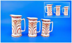 Set of Three Graduated Art Nouveau `Walton` Pattern Jugs, the sinuous, curvy, stylised floral