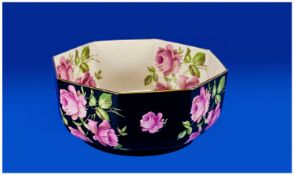 Large 1920`s Crown Ducal Octagonal Art Deco Bowl, decorated with pink rose on a black ground,
