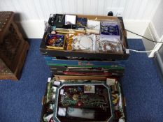Five Large Boxes Containing A Quantity Of Costume Jewellery, Comprising Brooches, Beads, Pendants,
