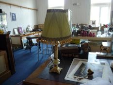 Onyx Table Lamp, raised on a gilt stand, fitted with a green shade.